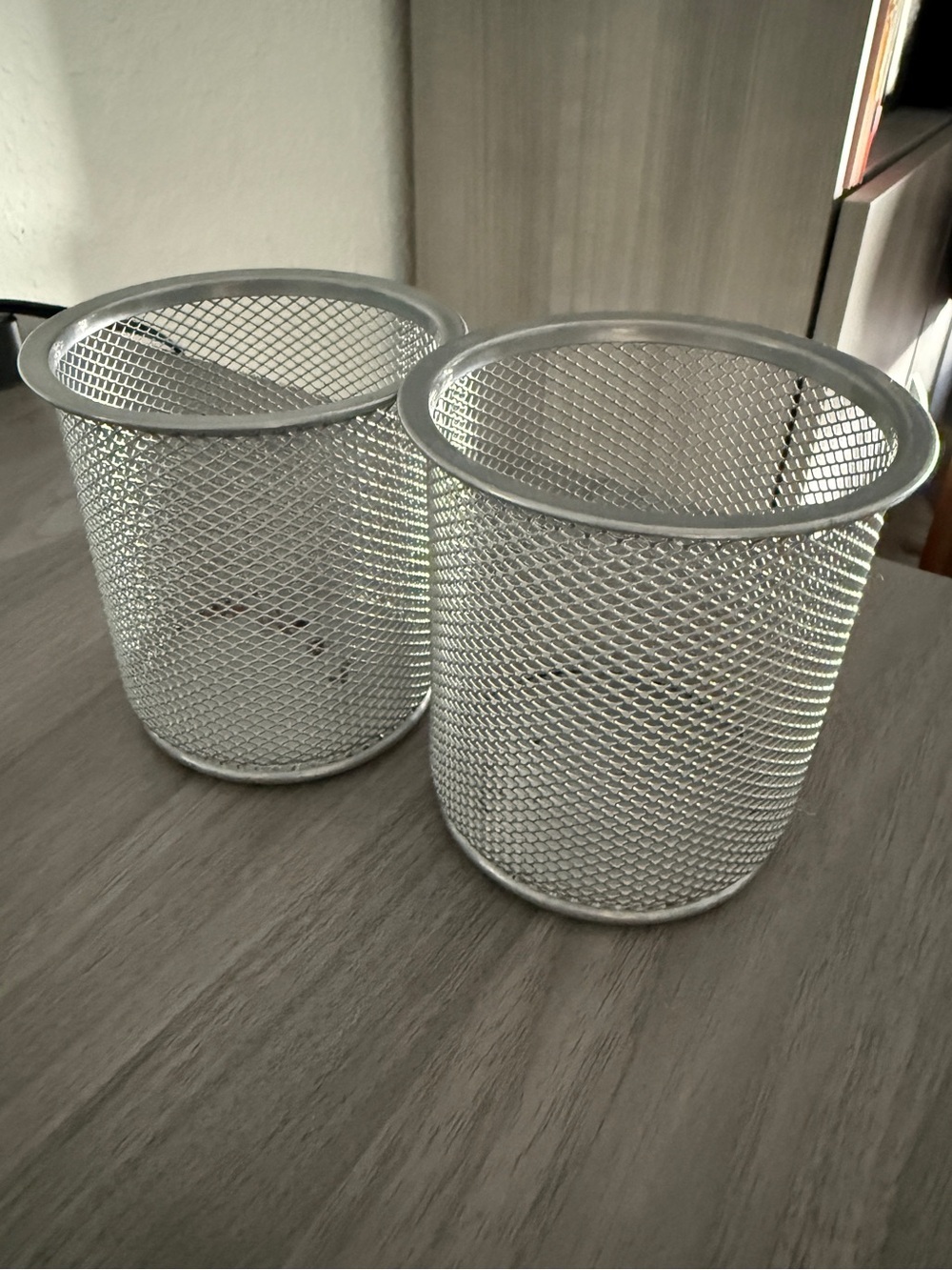Set of two metal pen and pencil holders